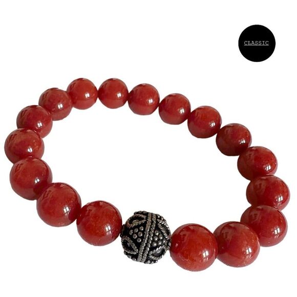 10mm rust jade stretch bracelet with 11mm Tibetan silver spacer. - Picture 1 of 4